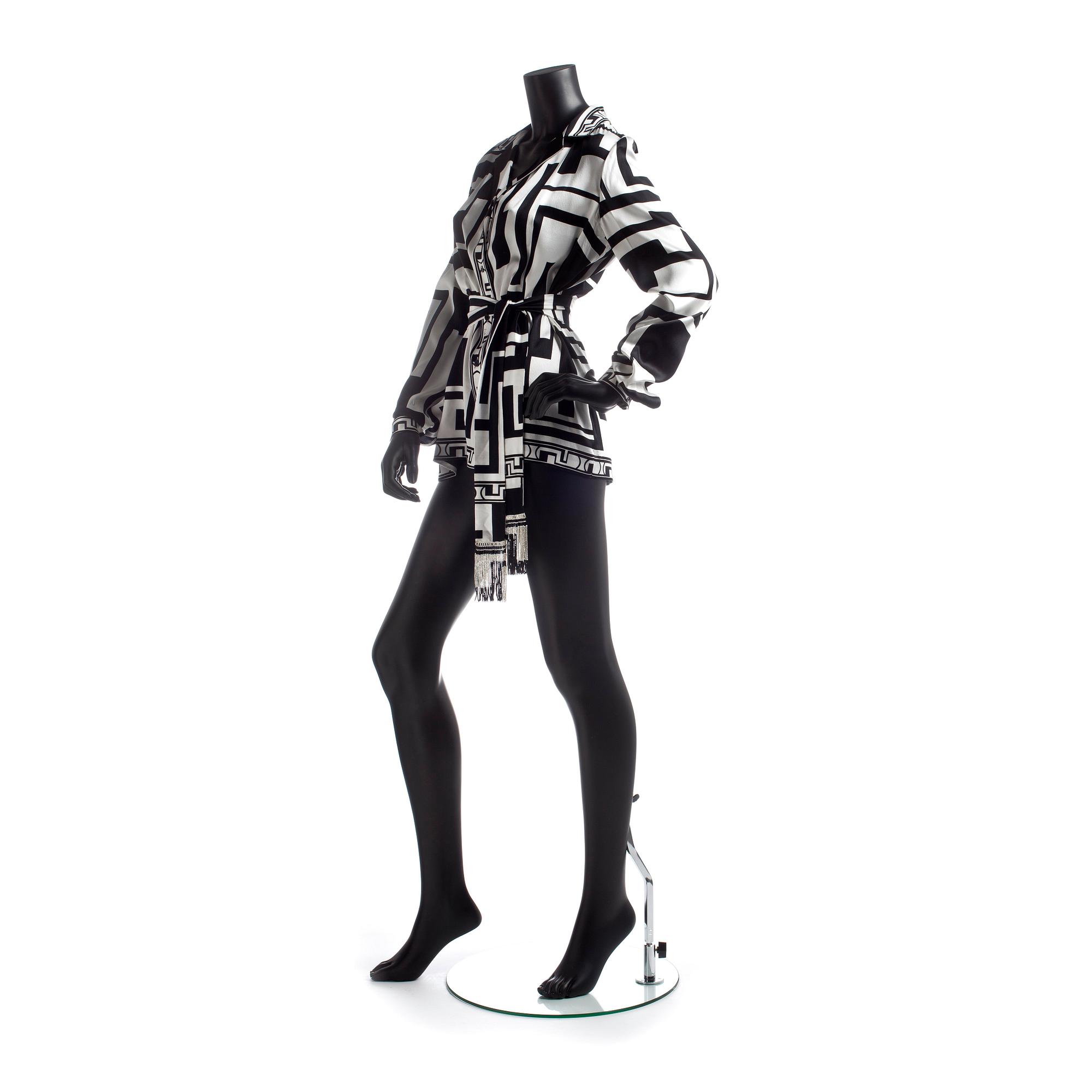 EMILIO PUCCI, a silk shirt with belt.