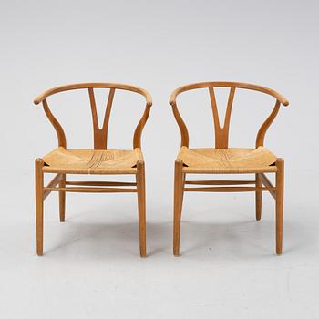 A pair of oak 'Y-chairs' by Hans J Wegner for Carl Hansen & Son, designed 1949.