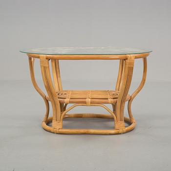A set of sofa, easy chairs and table in four parts, late 20th century.