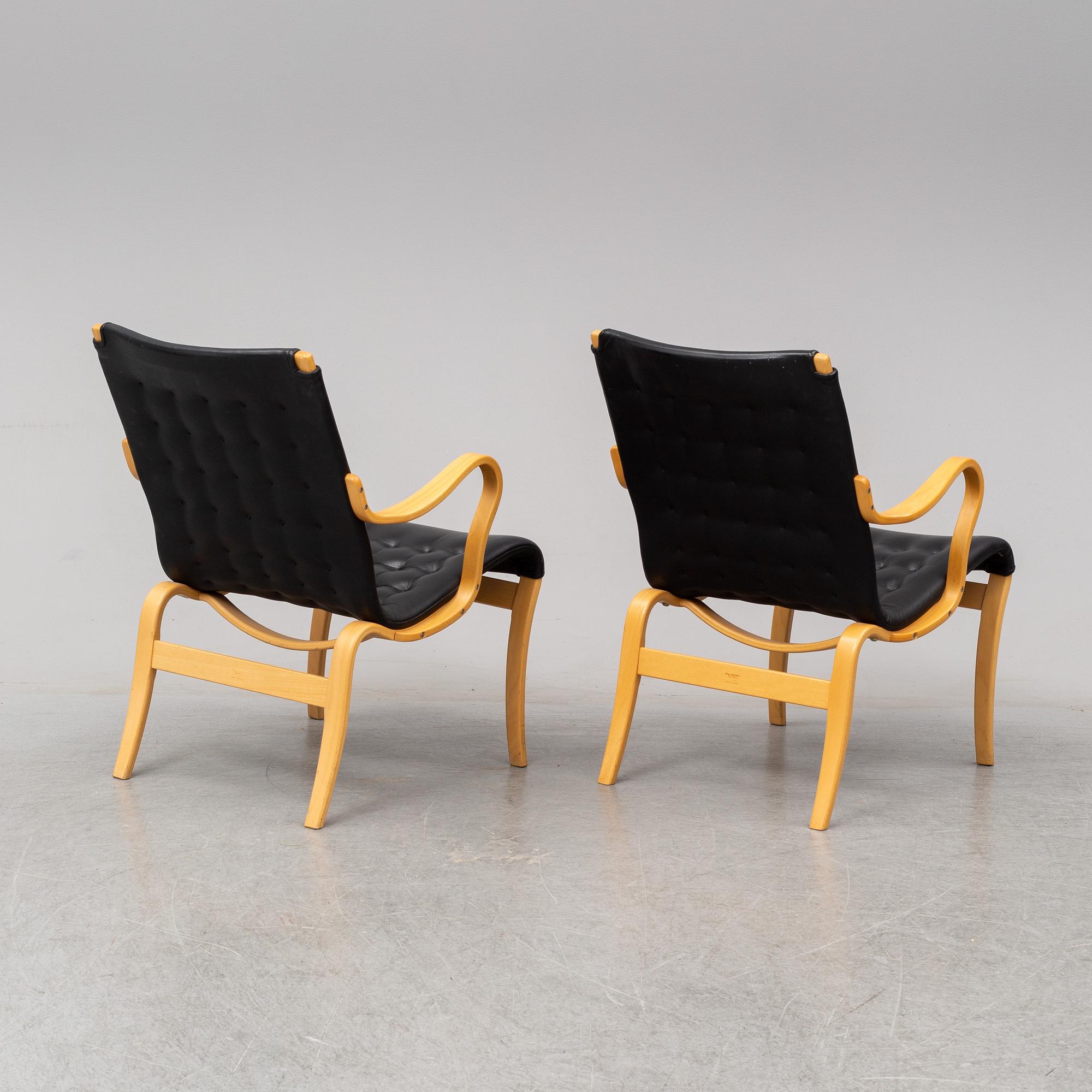 A pair of 'Mina' chairs designed by Bruno Mathsson, Bruno Mathsson International, Värnamo, Sweden.