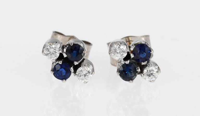 EARRINGS, set with blue sapphires and brilliant cut diamonds, app. tot. 0.16 cts.