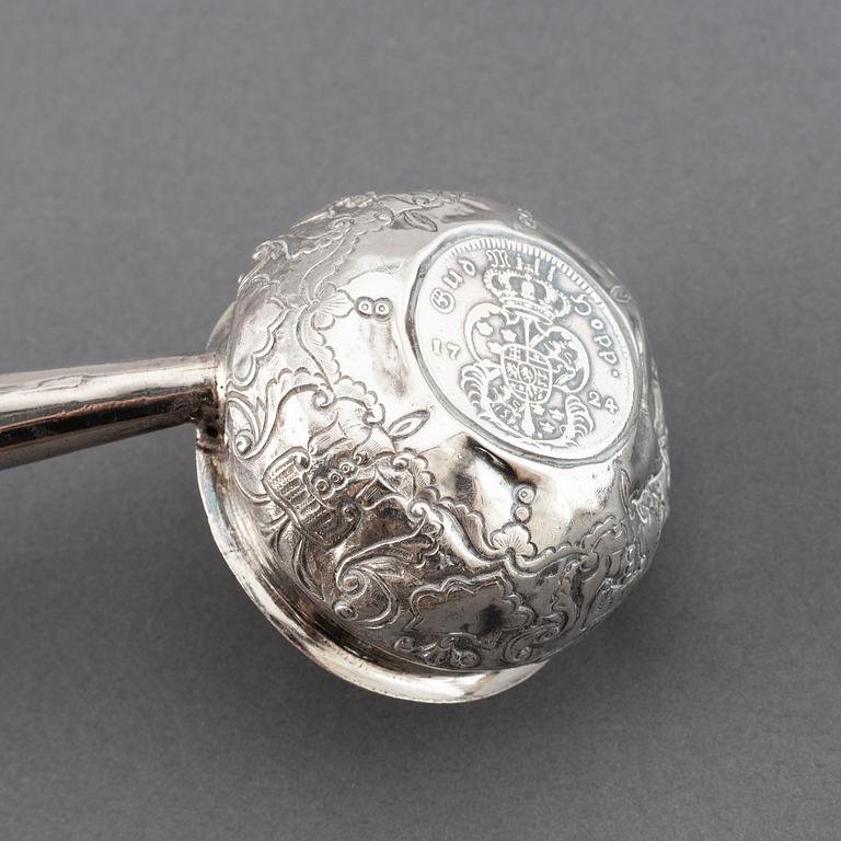 Two 19th century Swedish silver soup-ladles and a silver brandy-ladle.