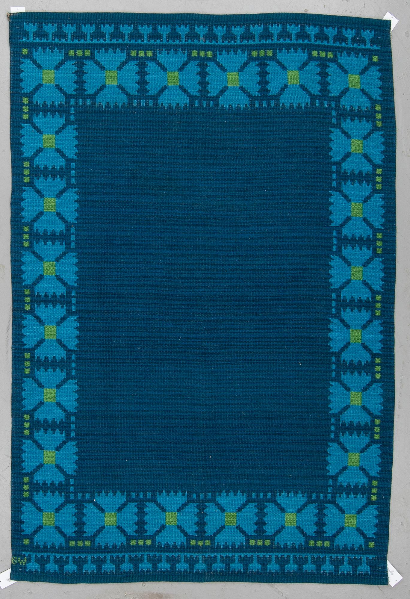 BERIT WOELFER, A CARPET, double-sided machine made, ca 198-200,5 x 132,5 cm, signed BW.