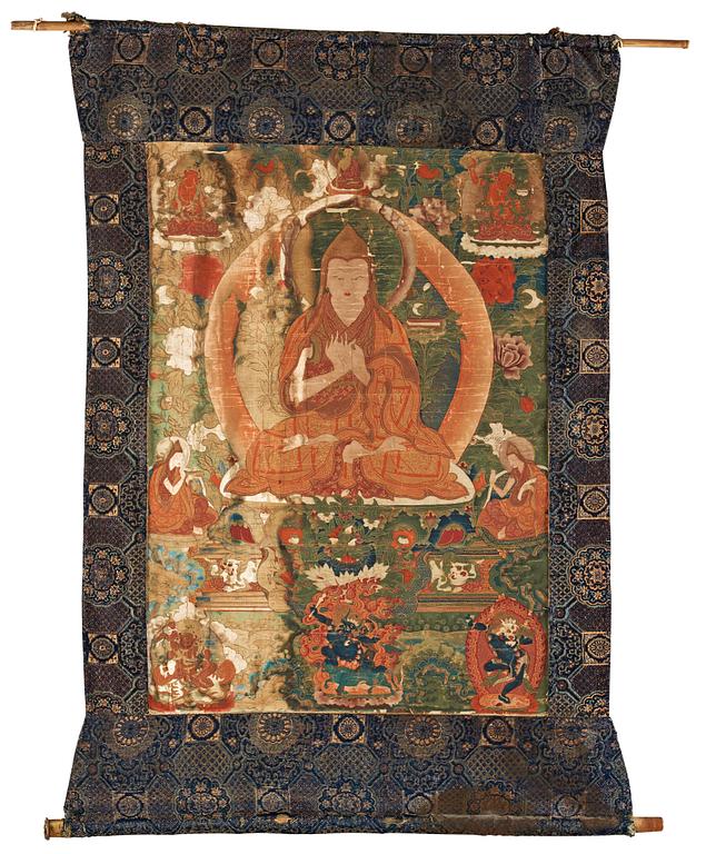 A finely painted Tibeto-Chinese thangka portraying Tsong Khapa, 18th/early 19th century.