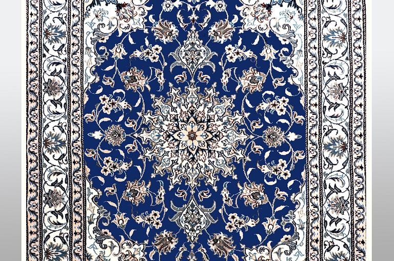 A carpet, Nain, part silk, ca 205 x  152 cm.