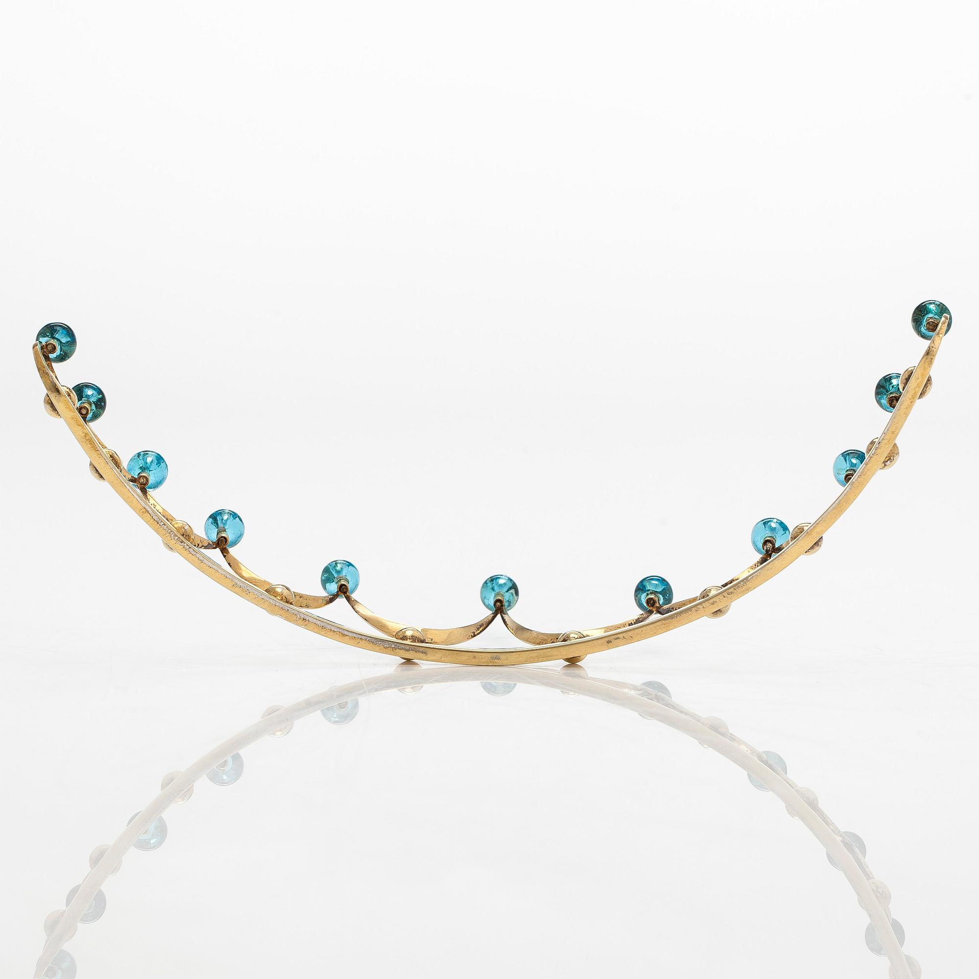 A gilded sterling silver tiara with topazes.