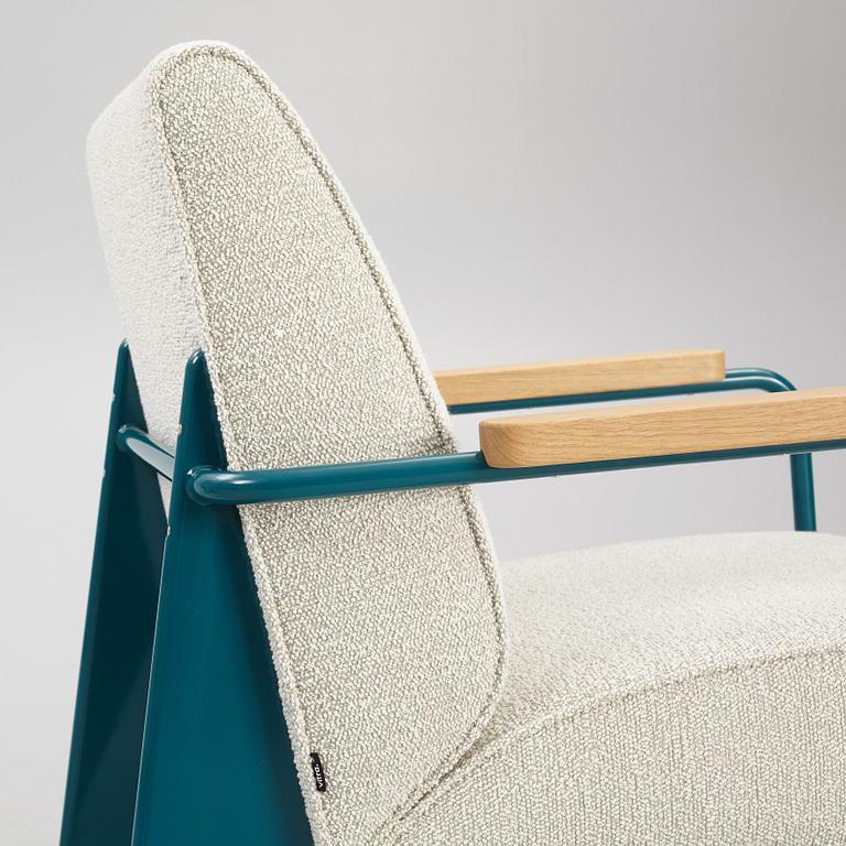 Jean Prouvé, a pair of "Fauteuil de Salon" armchairs, Vitra.