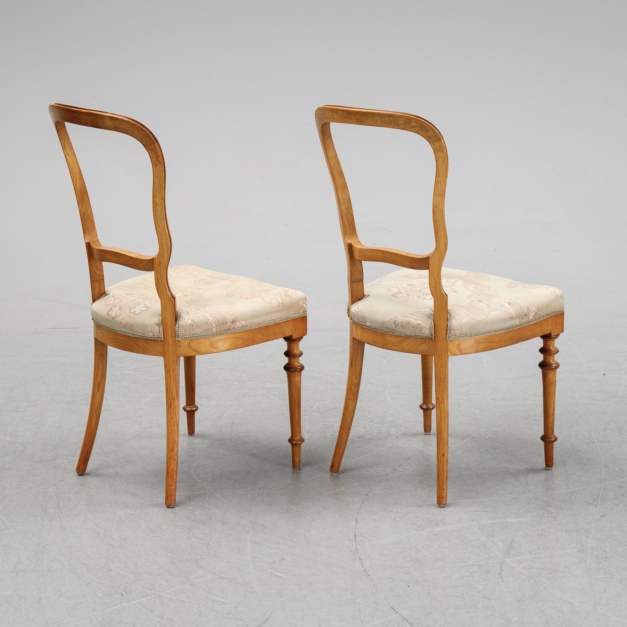 A set of six Danish Royal elm wood chairs, second half of the 19th Century.