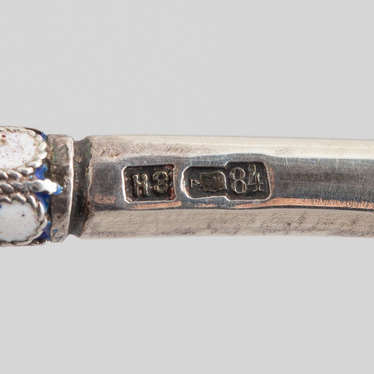 A Russian silver and enamel spoon, Moscow, 1908-26.
