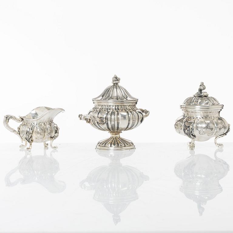 A silver sugar bowl and a set with creamer and sugar bowl, silver, 20th century.