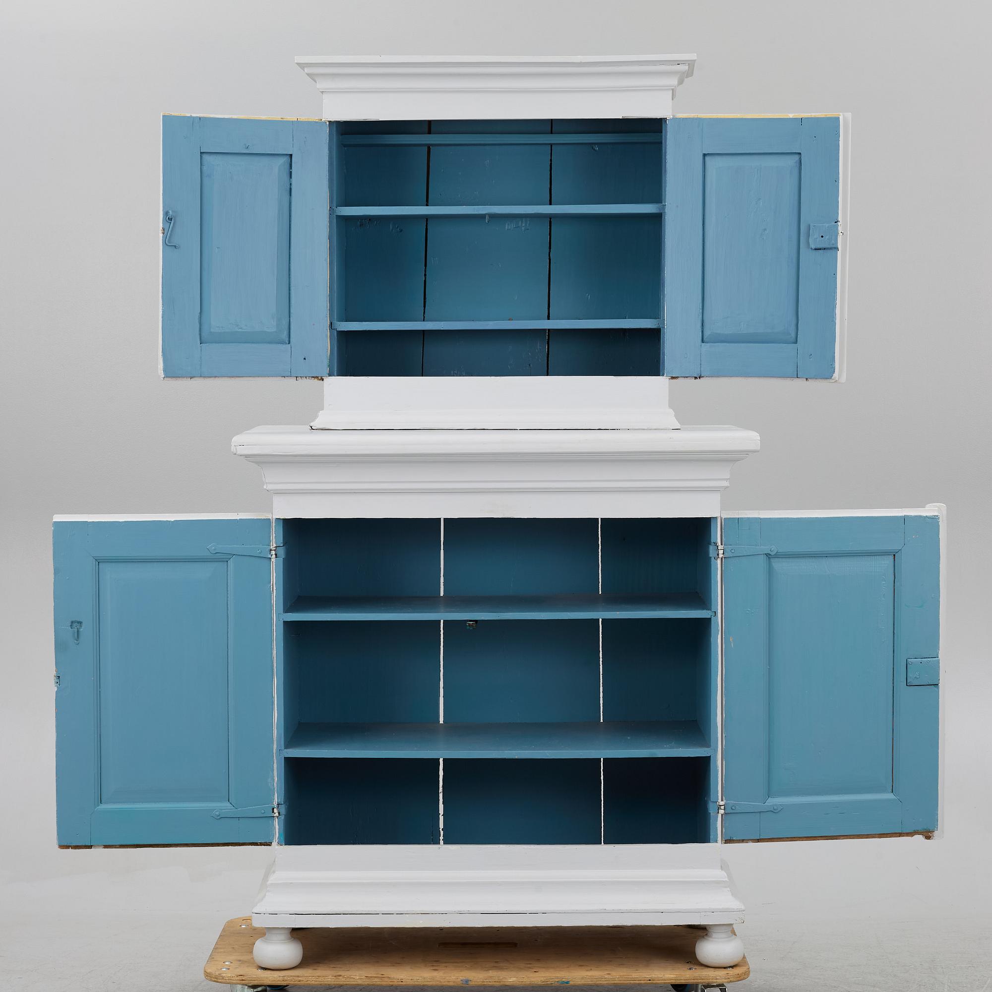 A two-part cabinet, 18th/19th century.