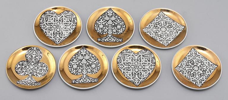 GLASUNDERLÄGG, 7 st, porslin, Fornasetti, Milano, Italien. 1900-talets tredje kvartal.