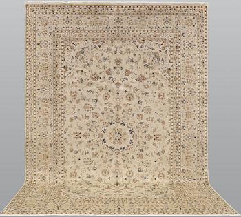 A Keshan carpet, c. 343 x 246 cm.