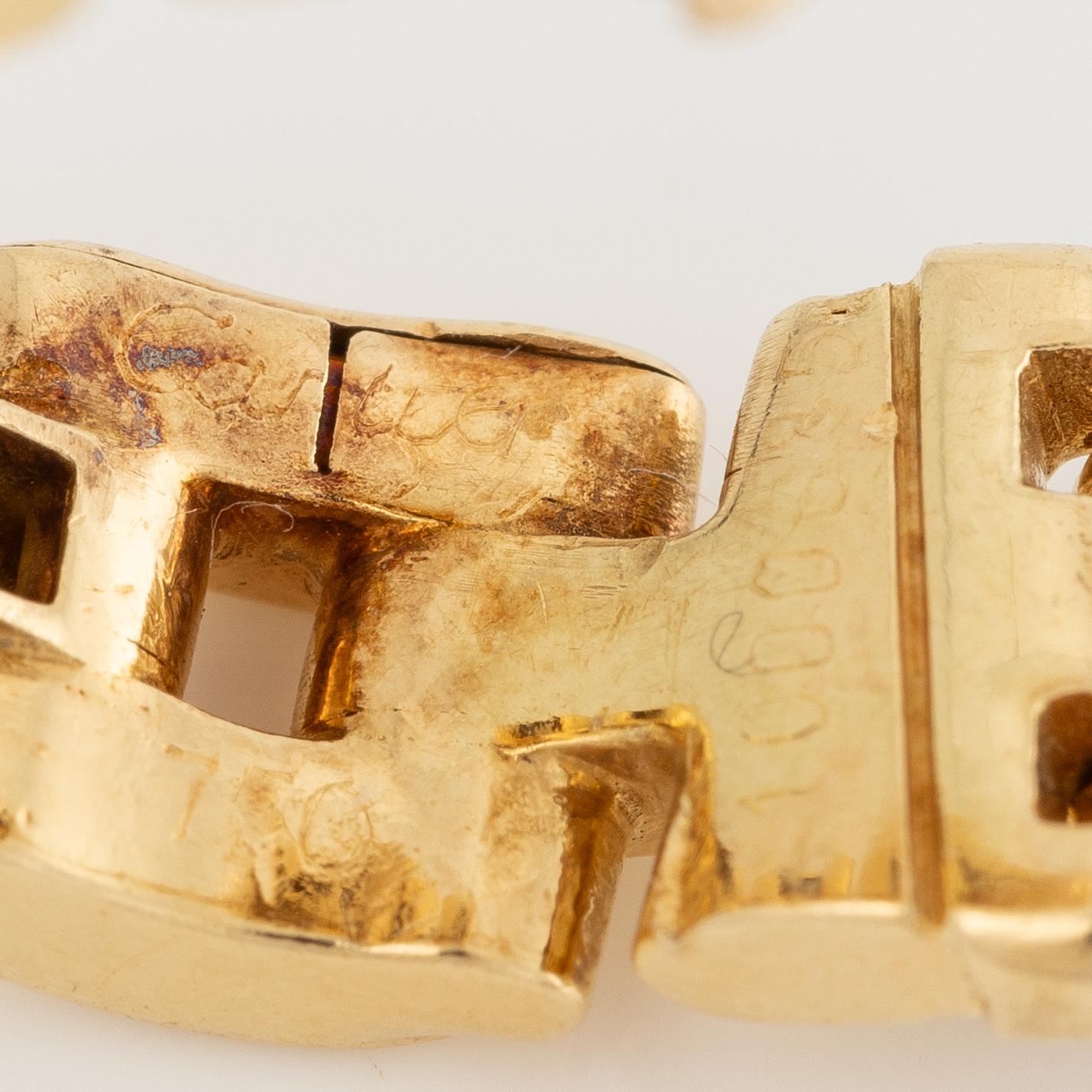 Cartier, earrings, 18K gold set with brilliant-cut diamonds.