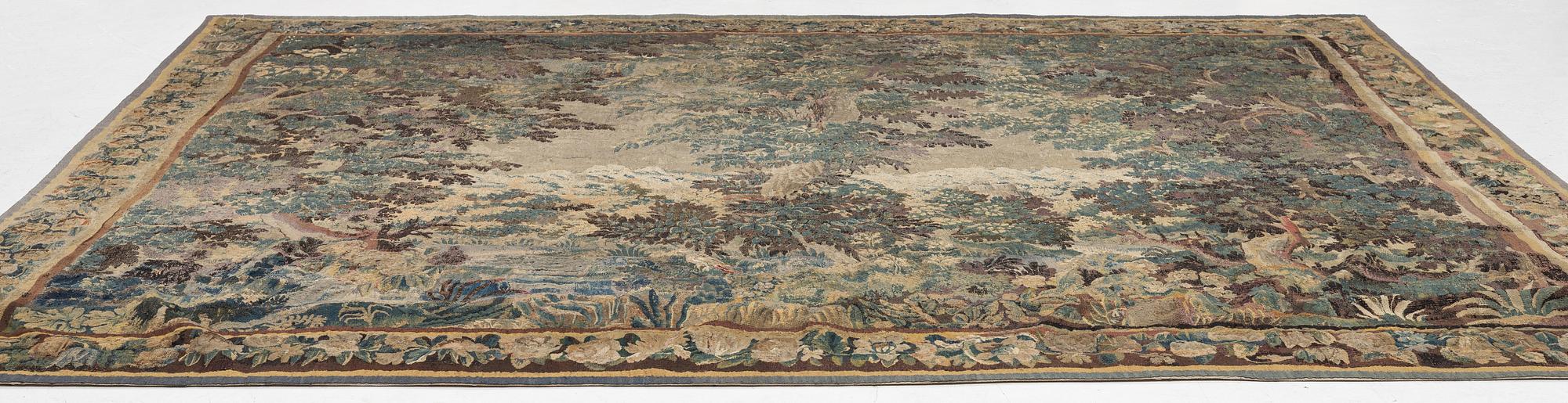 A flemish 'verdur' tapestry, c. 282 x 321 cm, 18 th century.