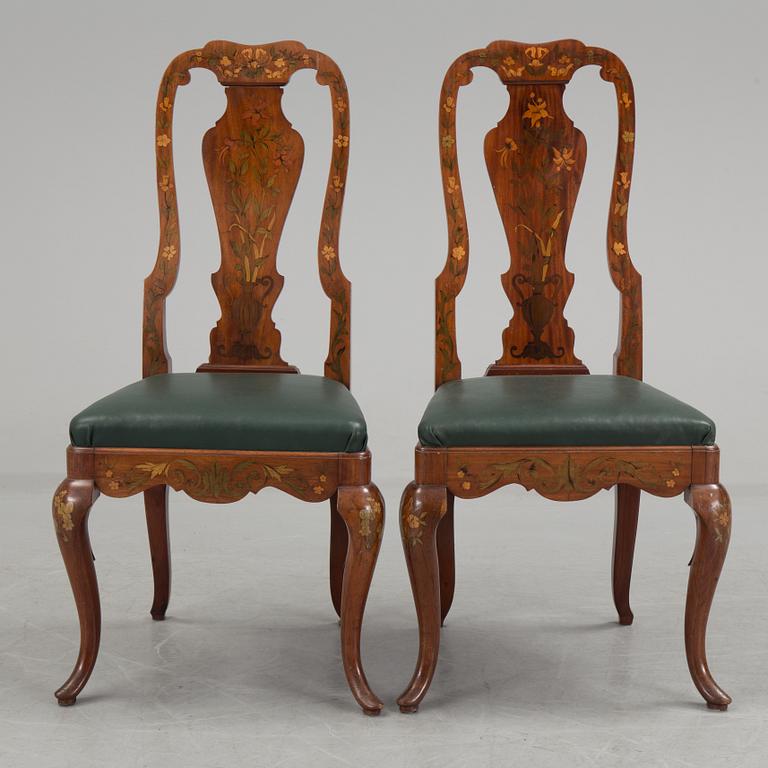 A pair of dutch rococo style chairs, first half of the 29th century.