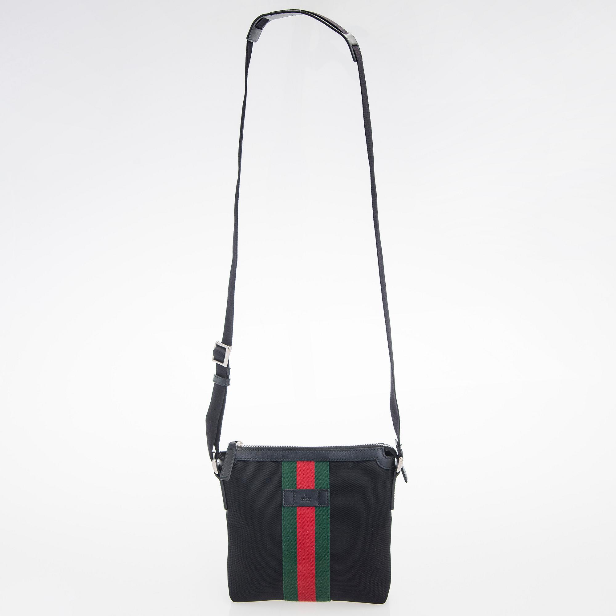 Gucci, a "Techno Canvas Web Messenger" bag.
