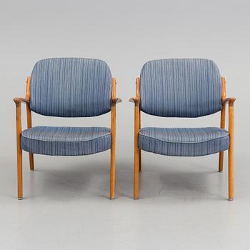 A pair of oak armchairs from Bröderna Andersson, mid 20th Century.