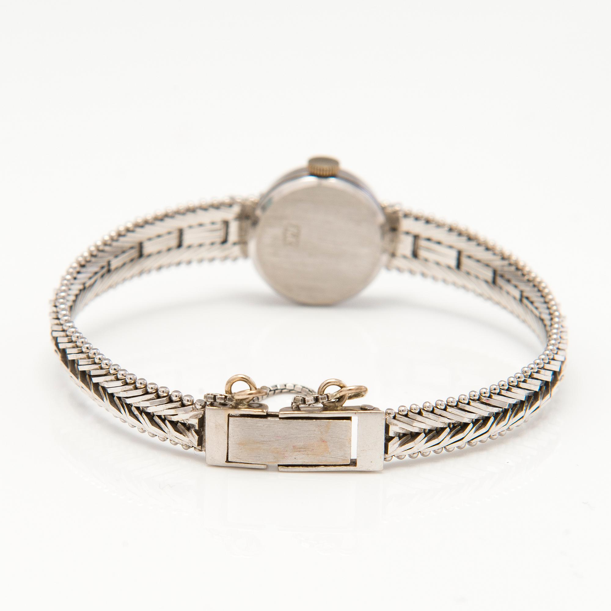 HILSON wrist watch, manual winding, 14K white gold, diamonds ca. 0.11 ct in total, 16 mm.