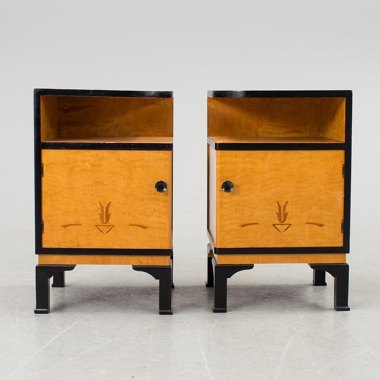 A pair of art déco bedside tables.