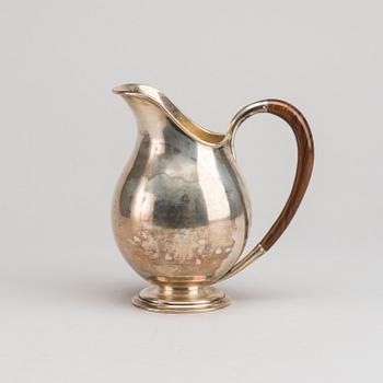 A Swedish 20th century sterling jug mark of Nordisk silverkonst Helsingborg 1948, total weight 347 gr.