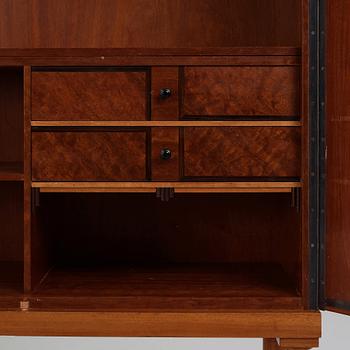 Otto Schulz, Boet, Gothenburg, probably, a cabinet covered with brown leather, dated 1942.