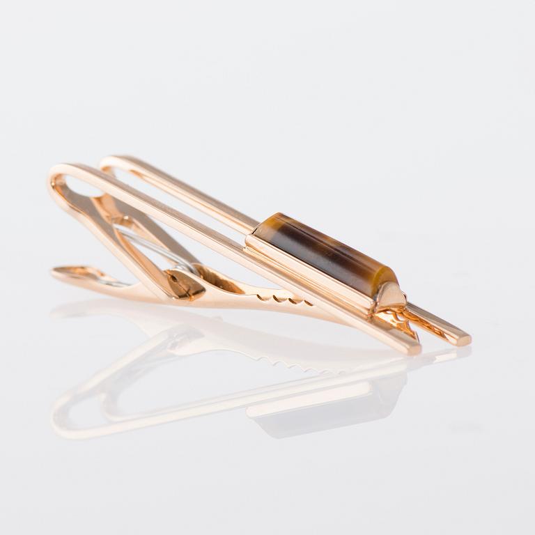 SLIPSNÅL, Elis Kauppi, Kupittaan kulta. 14K guld, tigeröga.  Vikt ca 6,3 g.