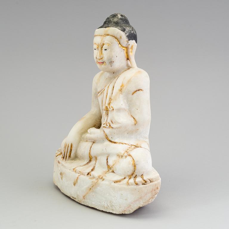 An alabaster figure of Buddha, probably Burma, 20th century.