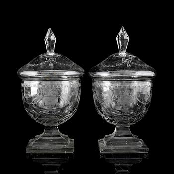 A pair of cut glass jars with covers, late 19th Century.