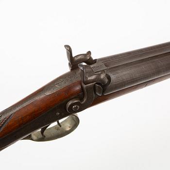 A mid-19th Century Belgian double barreled percussion shotgun marked Canon A Rubans.