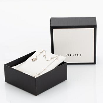 Gucci bracelet set with brilliant-cut diamonds.