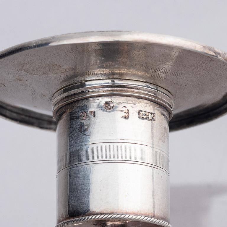 A pair of Swedish silver candlesticks, marks of Gustaf Folcker, Stockholm 1825.