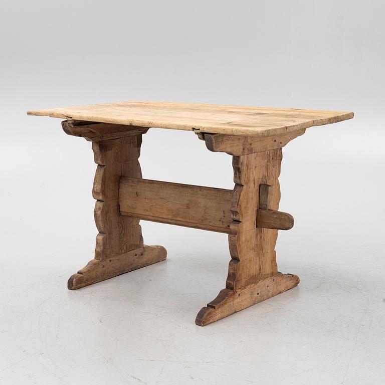 A pine trestle table, 19th century.