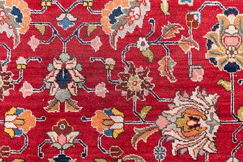 A semi-antique Tabriz carpet, c 358 x 248 cm.