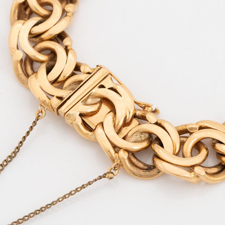 18K gold bracelet.