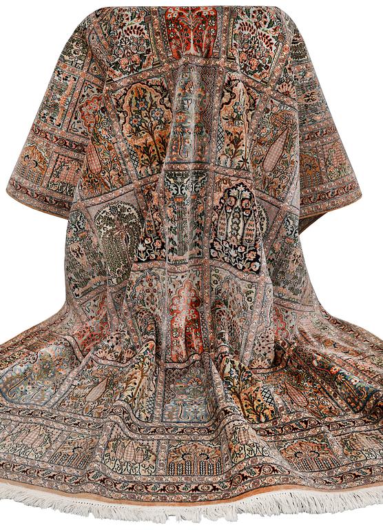 A silk Kashmir carpet, approx. 327 x 243 cm.