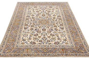 A Keshan carpet, c. 340 x 218 cm.