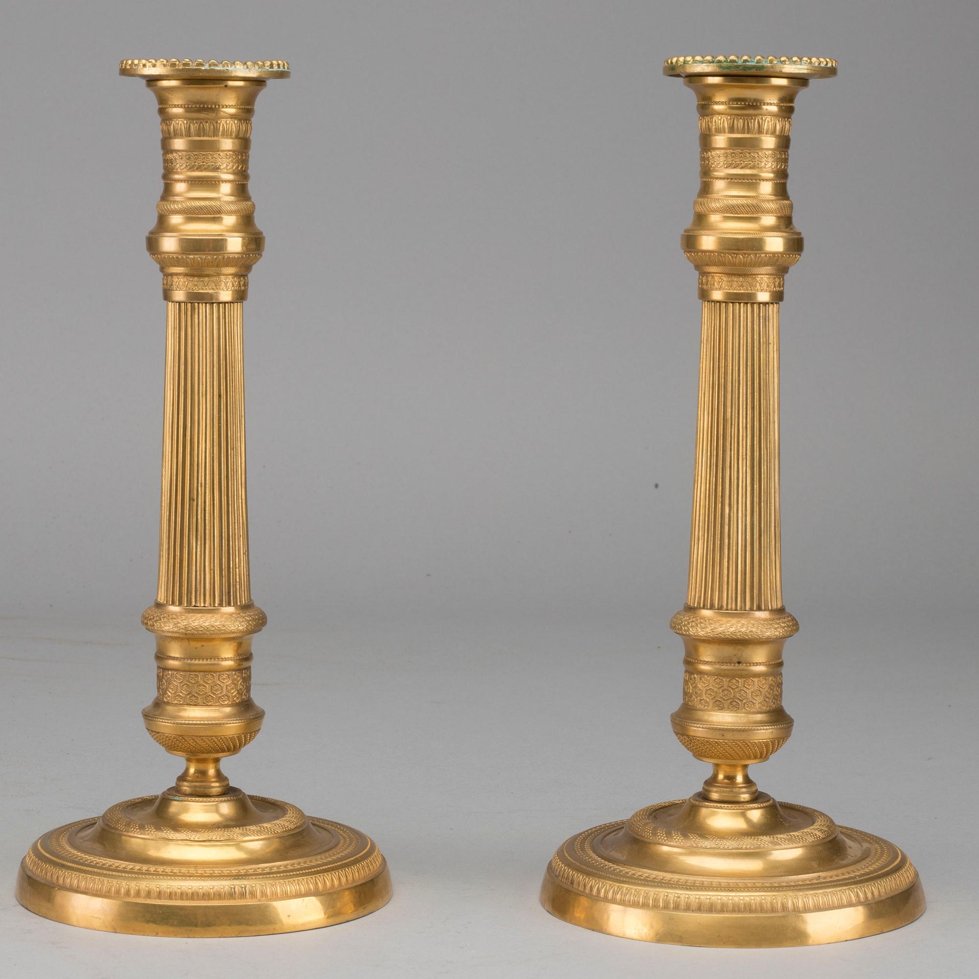 LJUSSTAKAR, ett par, brons, empire, 1800-talets första hälft.