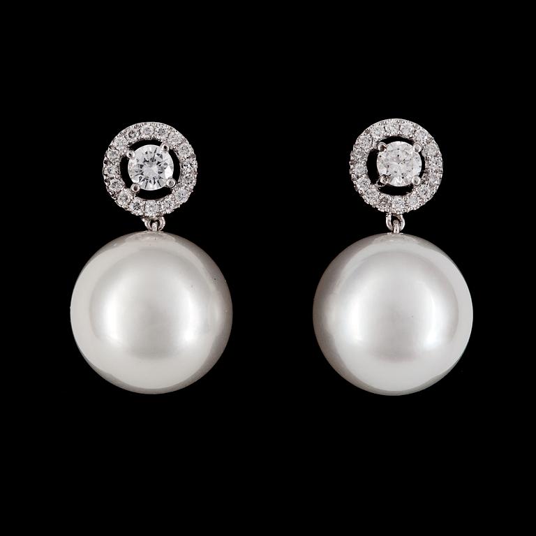 EARRINGS, cultured South Sea pearls, 12,8 mm, and brilliant cut diamonds, tot. 0.56 cts.