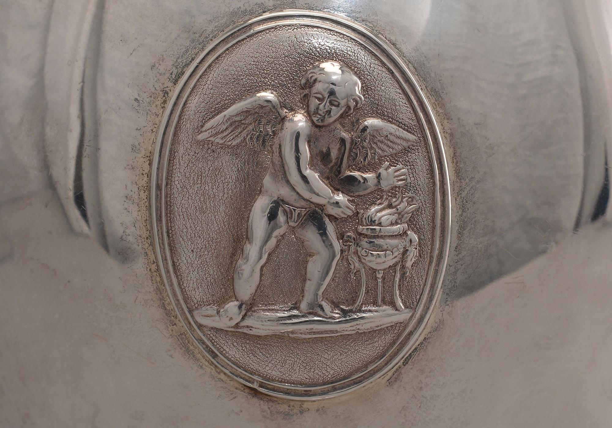 A TEA SERVICE, 4 parts, sterling silver, London 1874 England. Weight 2360 g.