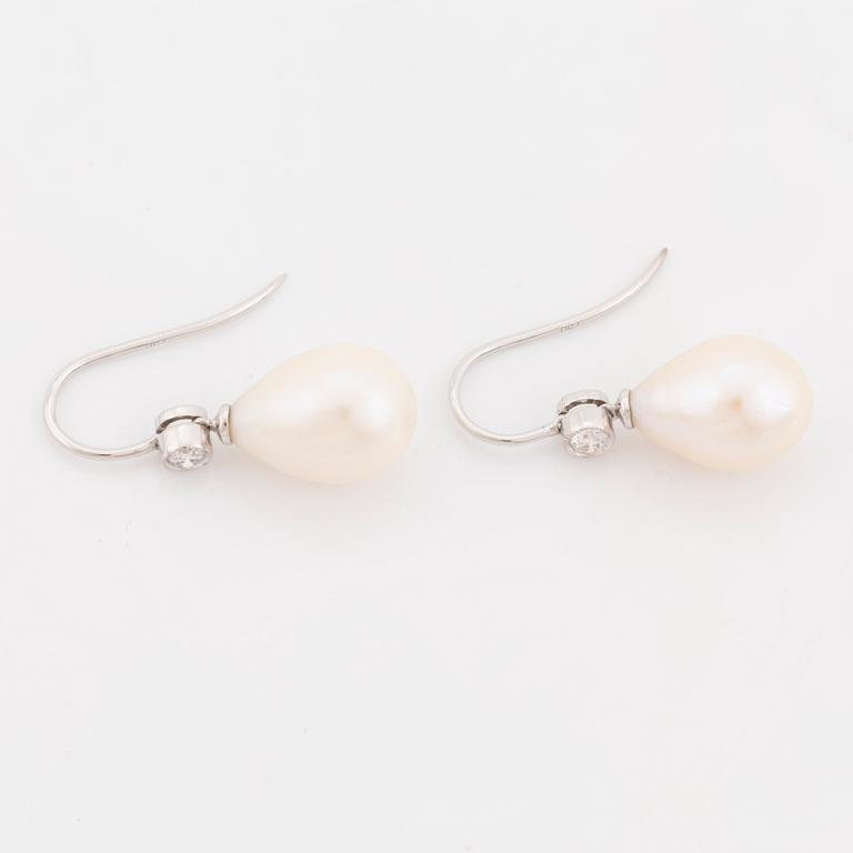 Cultured pearl and brilliant cut diamond earrings.