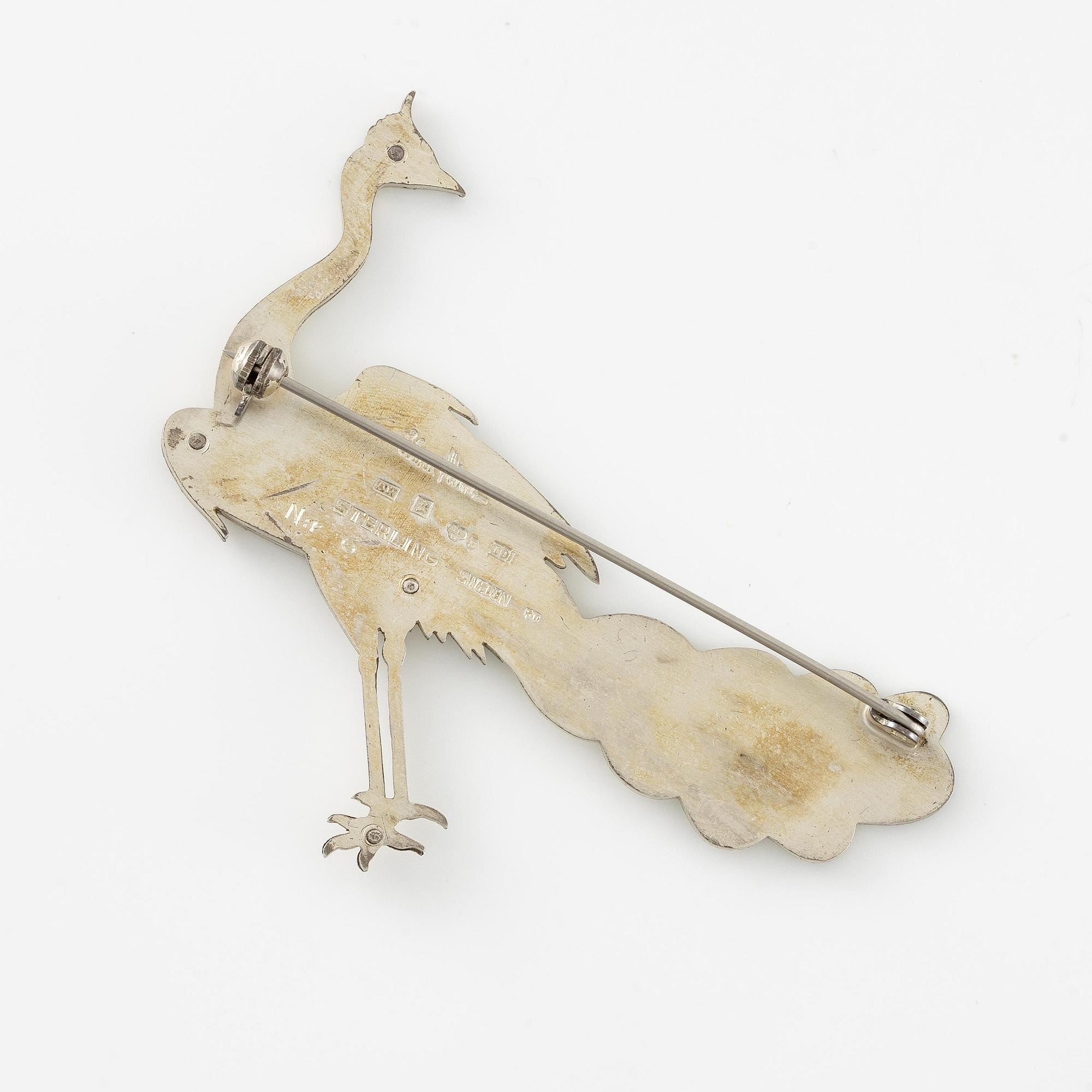 Wiwen Nilsson, a brooch, sterling silver, in the form of a peacock, Lund 1959.