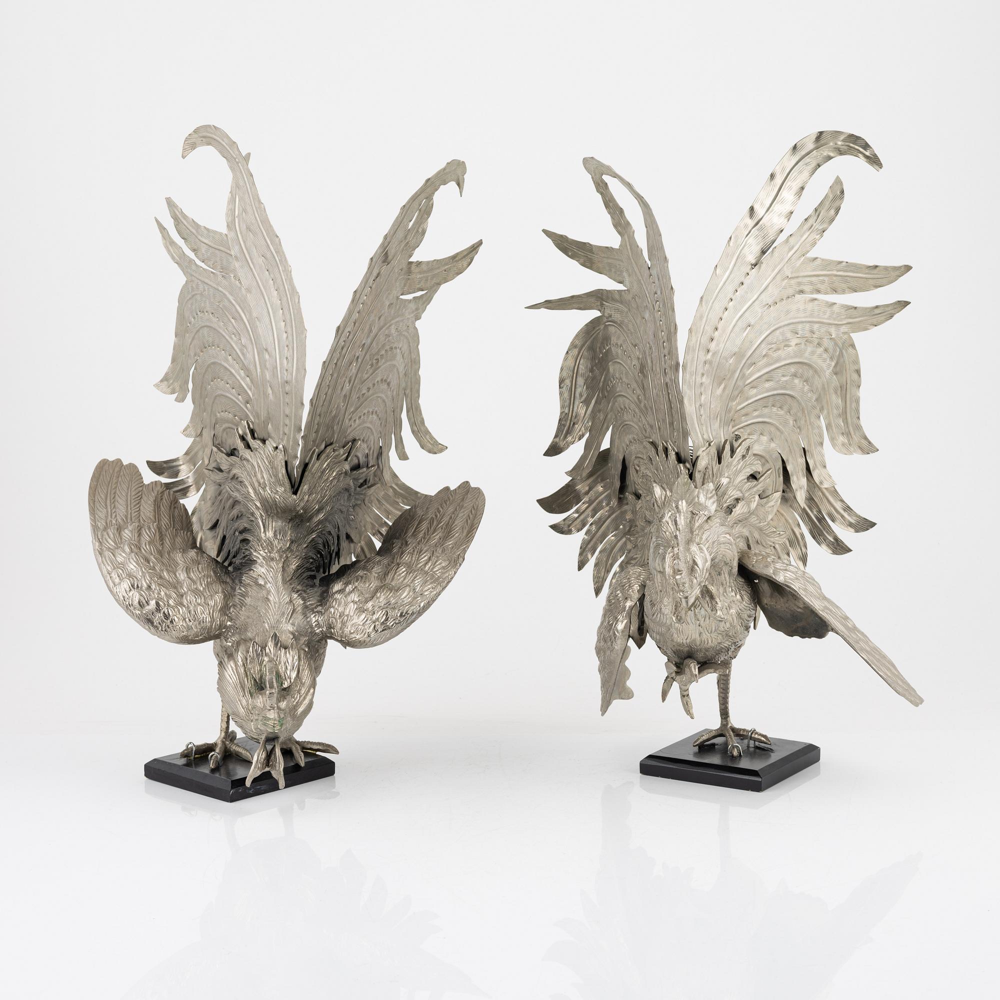 A pair of metal table decorations, 20th century.