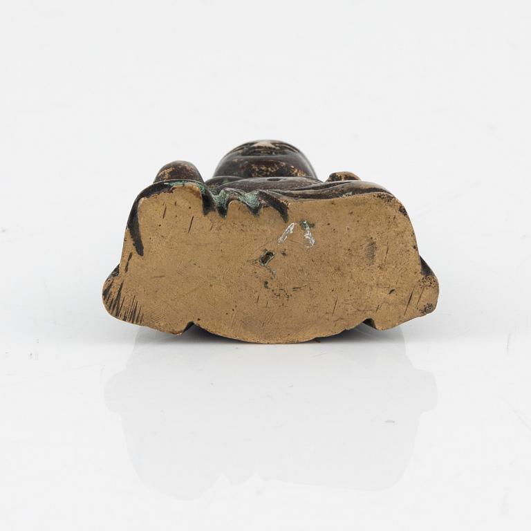 A bronze scultpure/scroll weight, Qing dynasty, 19th Century.