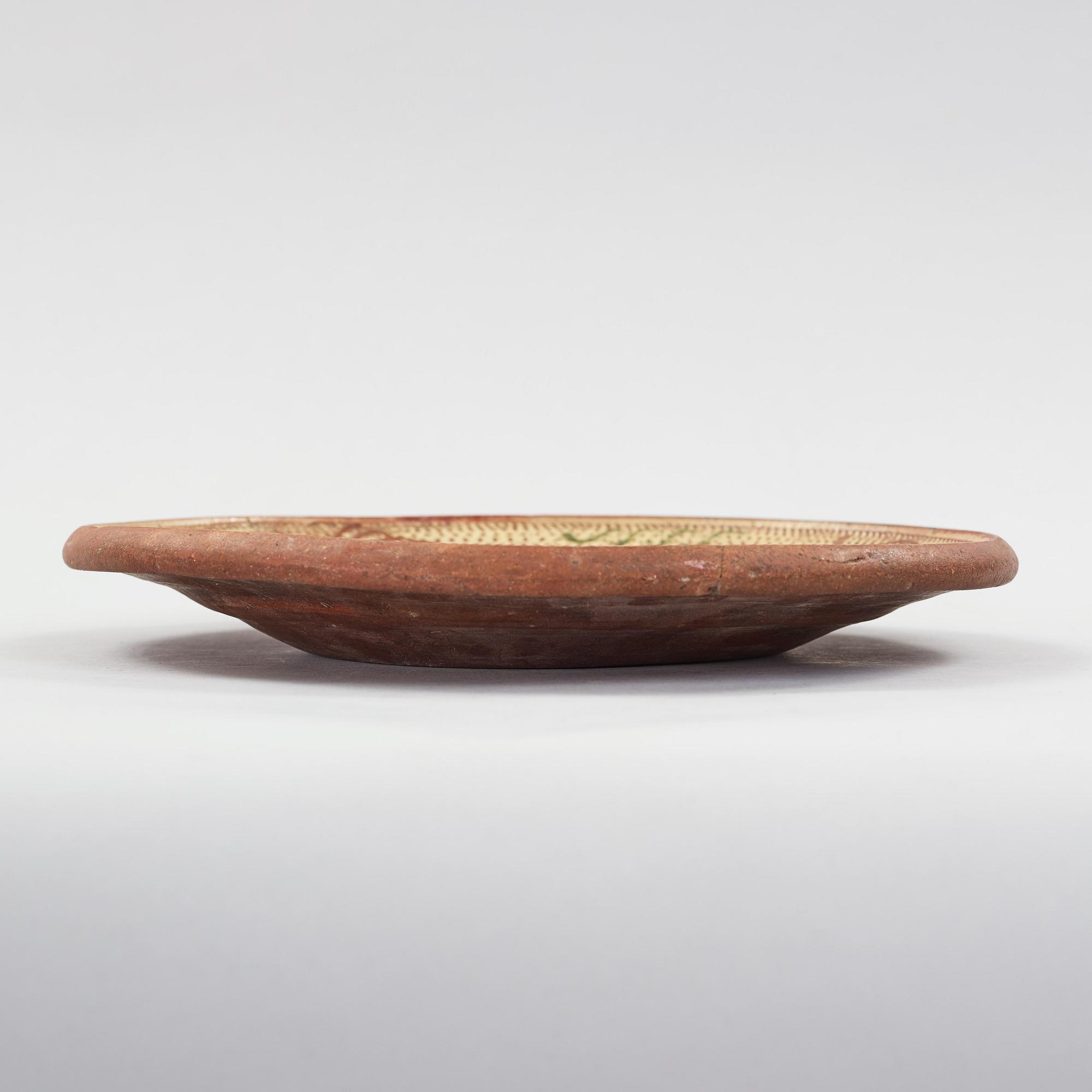 a earthenware plate dated 1807.