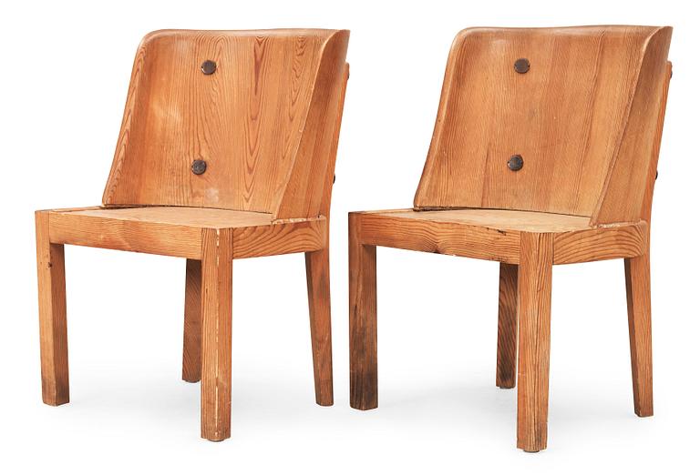 A pair of Axel Einar Hjorth 'Lovö' stained pine armchairs, Nordiska Kompaniet, 1930's.