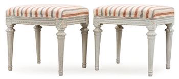 697. A pair of Gustavian stools by M. Lundberg.