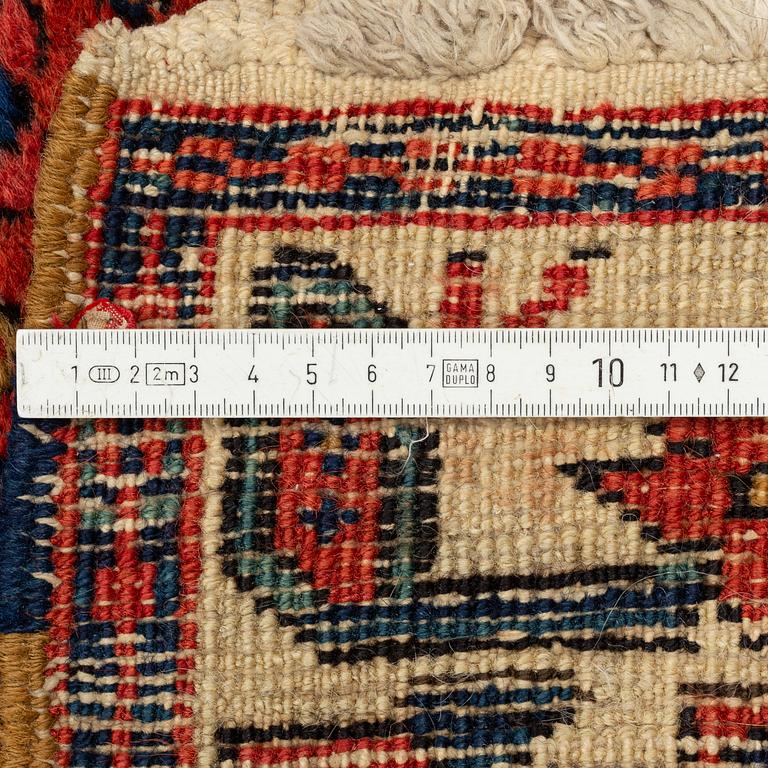 An antique runner, probably Karadja, circa 360 x 98 cm.