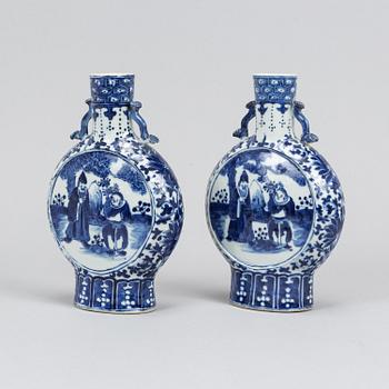 A pair of blue and white moon flasks, Qing dynasty, 19th Century.