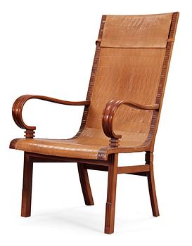 501. A Hjalmar Jackson pear wood and brown leather easy chair, Stockholm 1934,